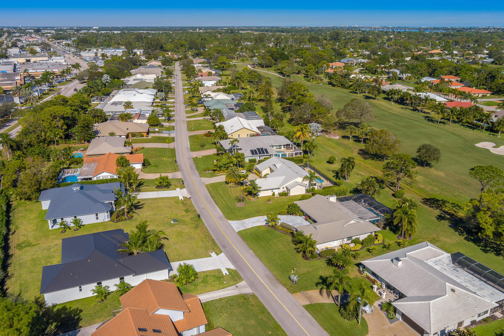 3972 Southeast Fairway West Stuart, FL 34997 - Photo 11 of 52 an aerial view of residential houses with outdoor space