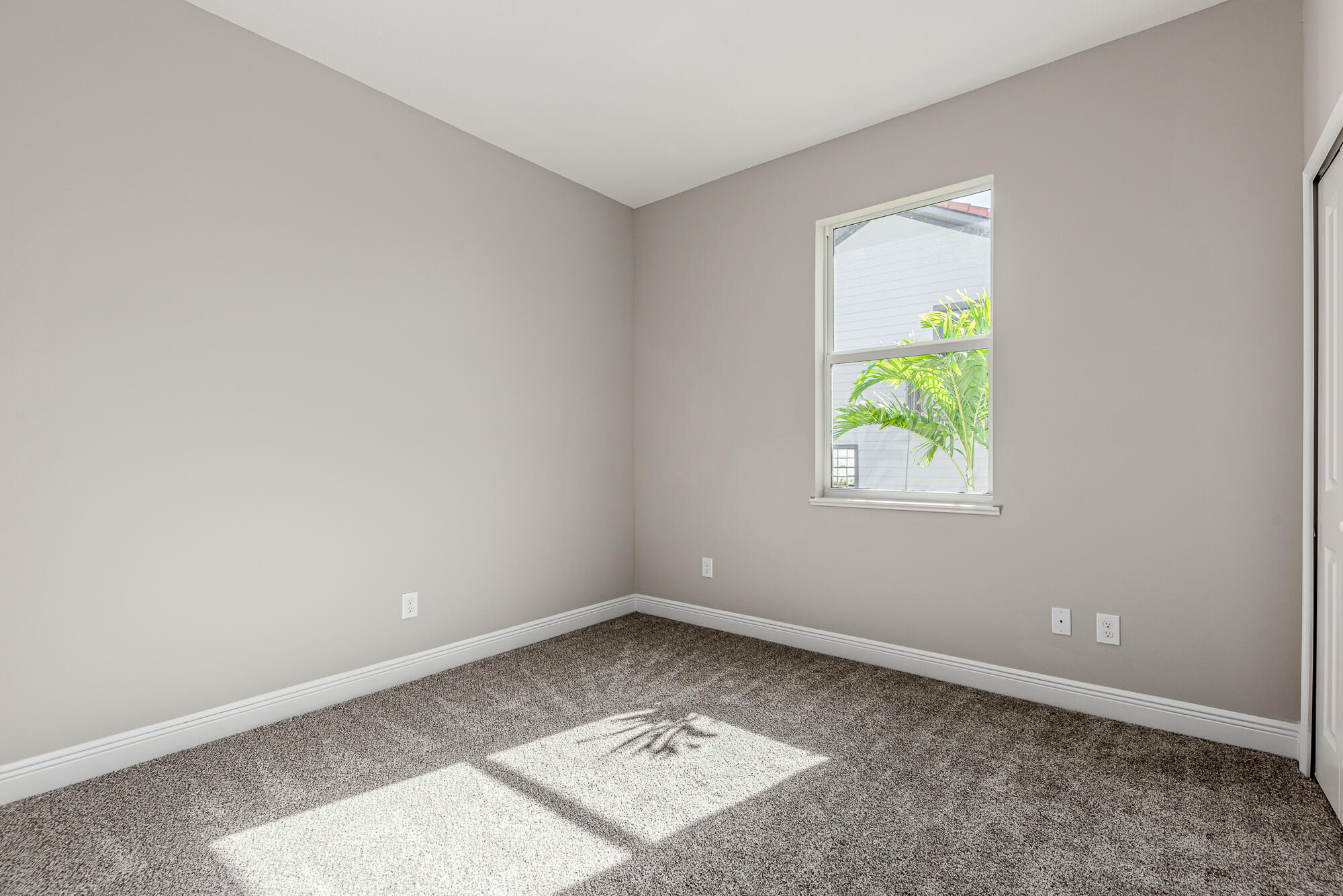 3972 Southeast Fairway West Stuart, FL 34997 - Photo 31 of 52 an empty room with a window