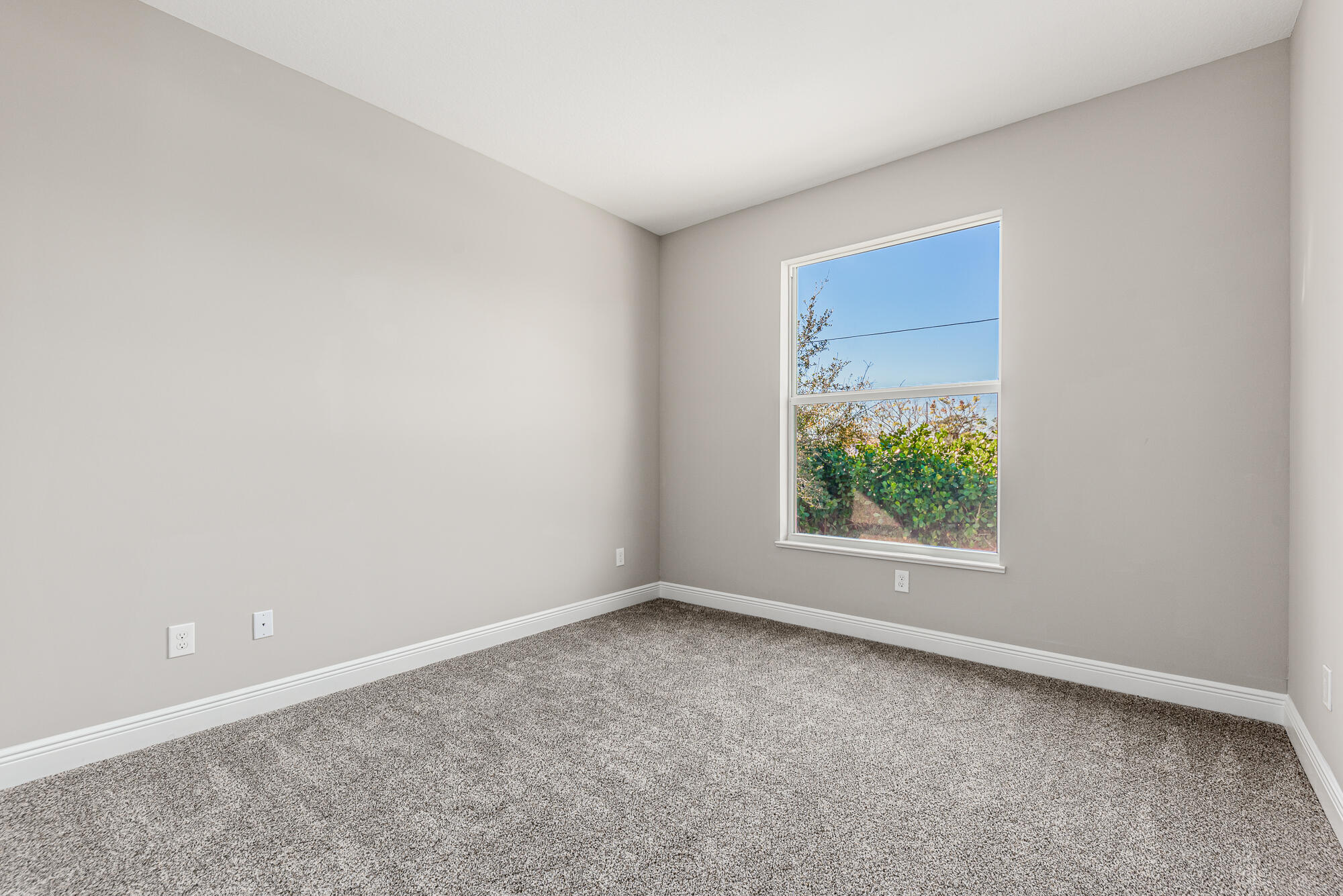 3972 Southeast Fairway West Stuart, FL 34997 - Photo 33 of 52 an empty room with windows