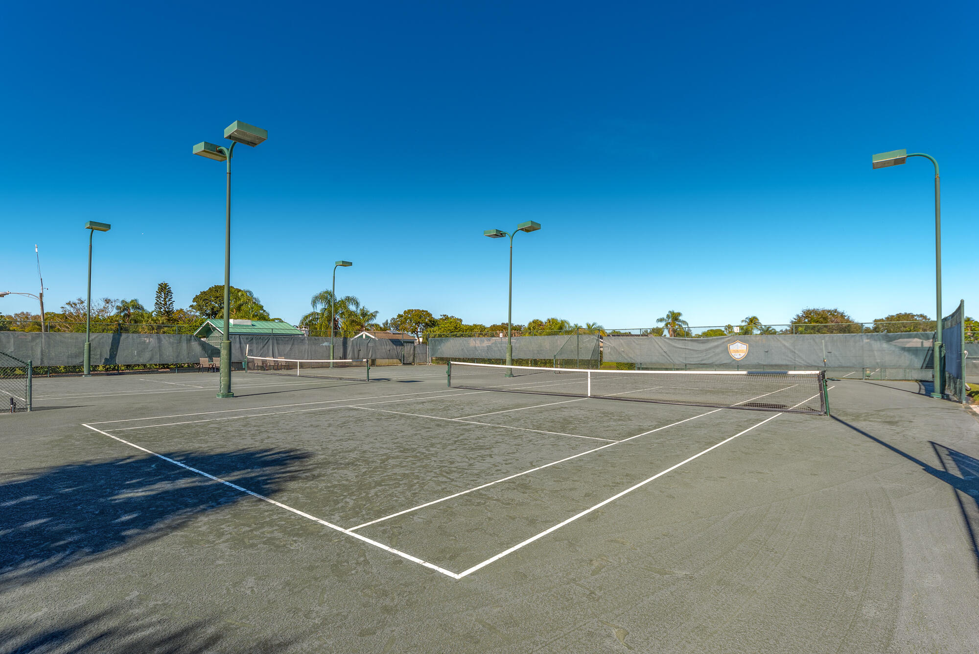 3972 Southeast Fairway West Stuart, FL 34997 - Photo 48 of 52 a view of a tennis court