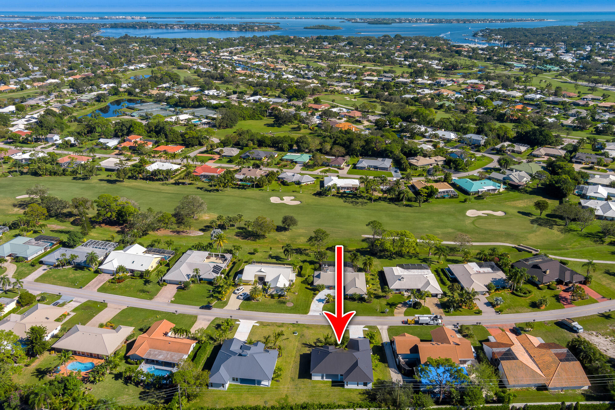 3972 Southeast Fairway West Stuart, FL 34997 - Photo 8 of 52 an aerial view of multiple house