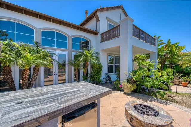 an aerial view of multiple house with yard