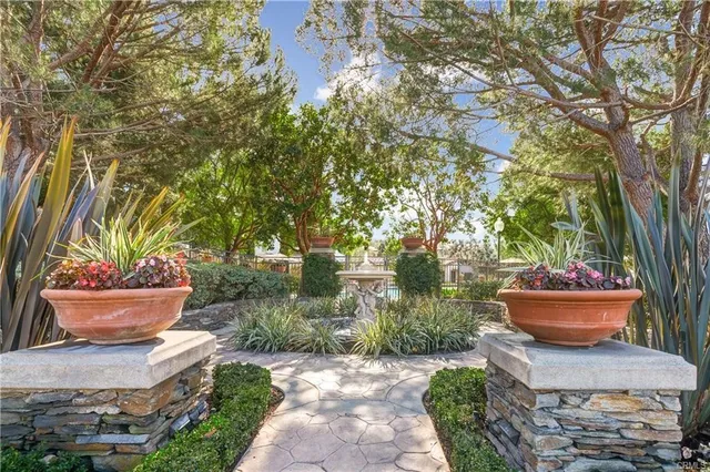a view of a swimming pool with an outdoor seating