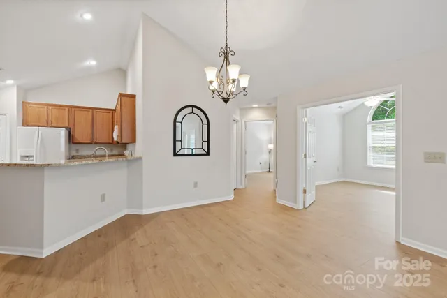 a view of a kitchen with a sink and dishwasher