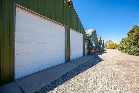 a view of a house with a road