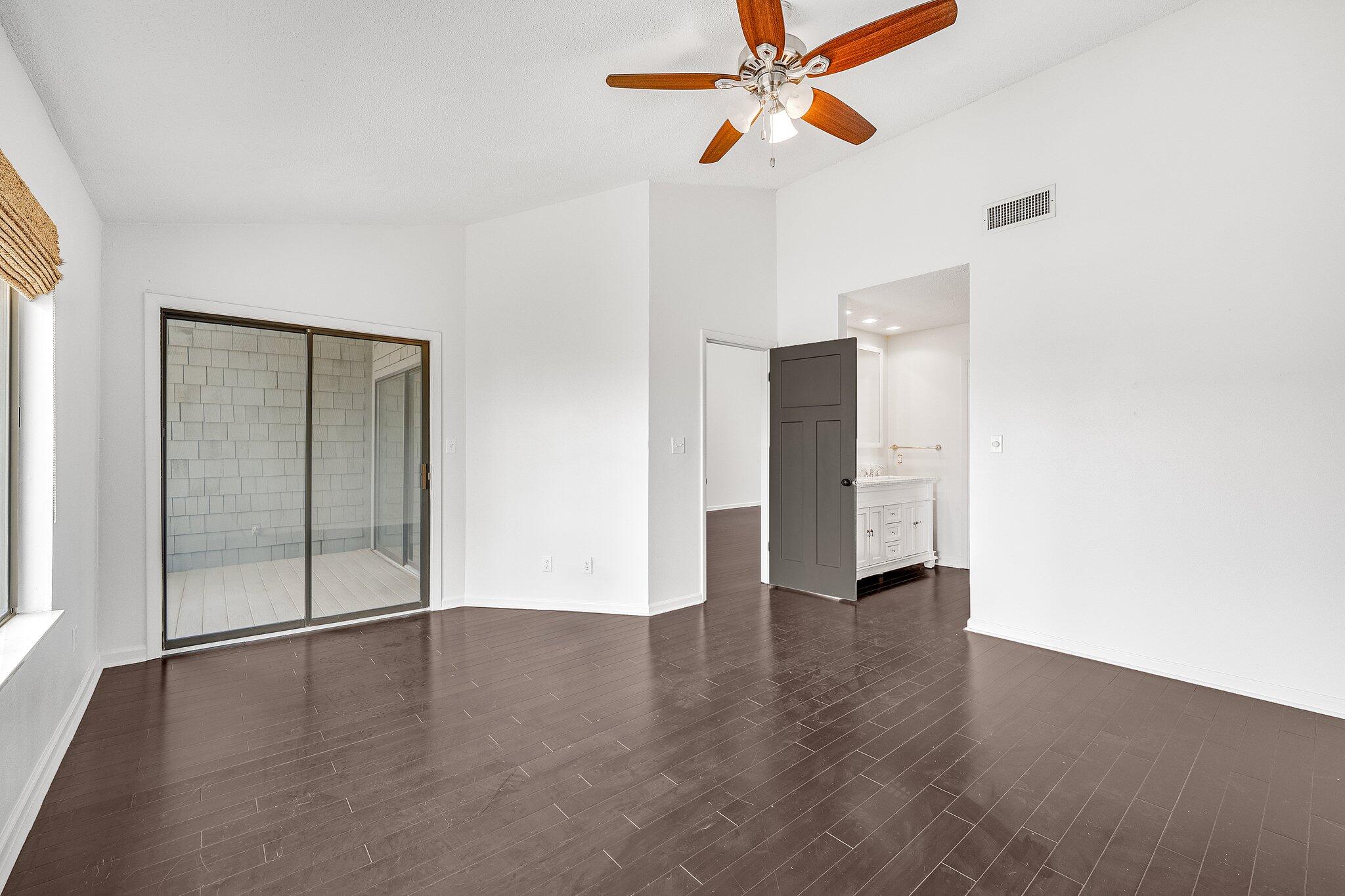 8983 Heron Walk Drive, Unit 8983 Miramar Beach, FL 32550 - Photo 15 of 57 a view of empty room with wooden floor