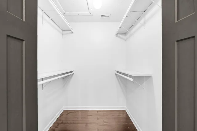 a white bath tub sitting next to a window