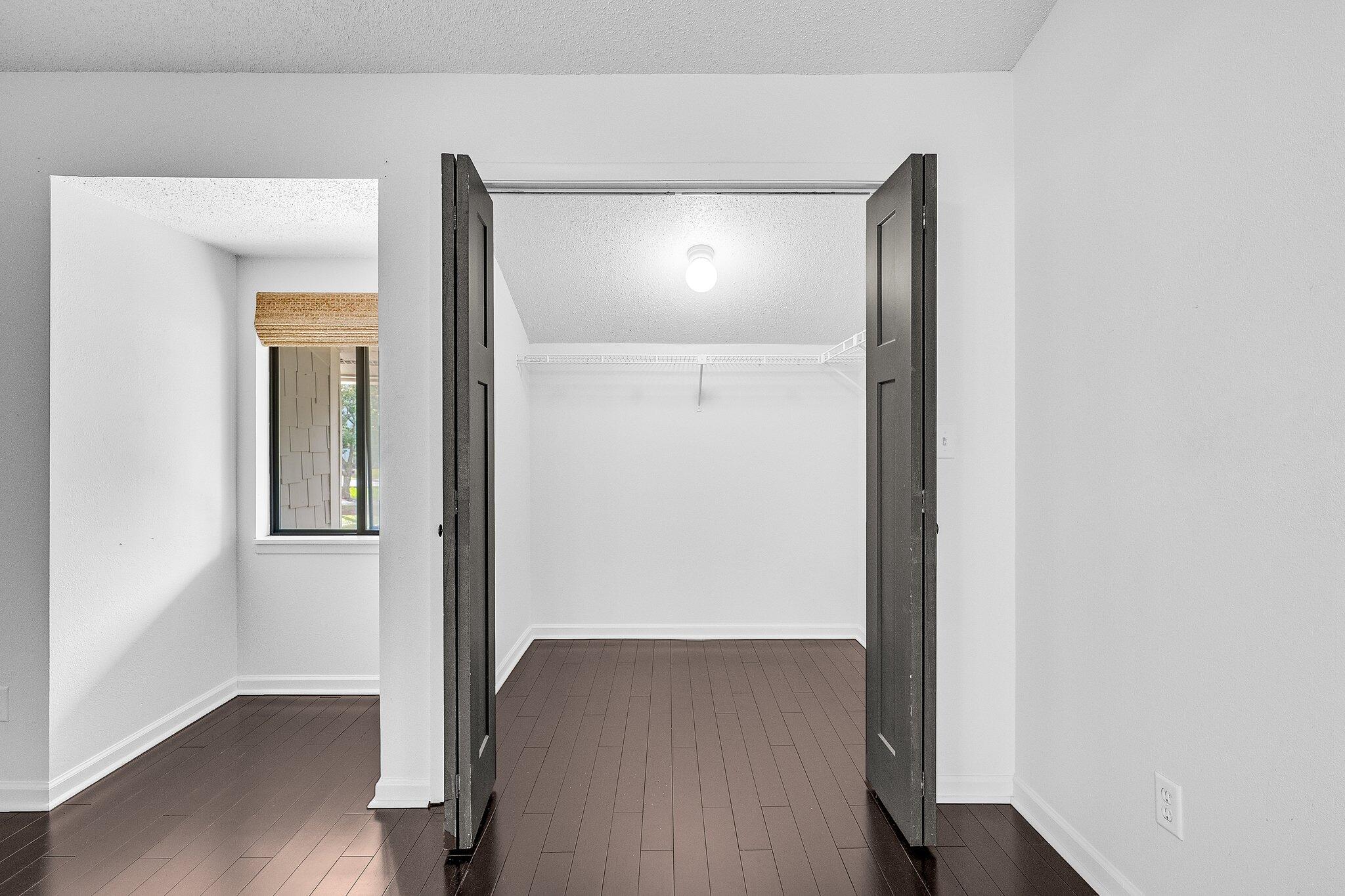 8983 Heron Walk Drive, Unit 8983 Miramar Beach, FL 32550 - Photo 24 of 57 a view of hallway with wooden floor