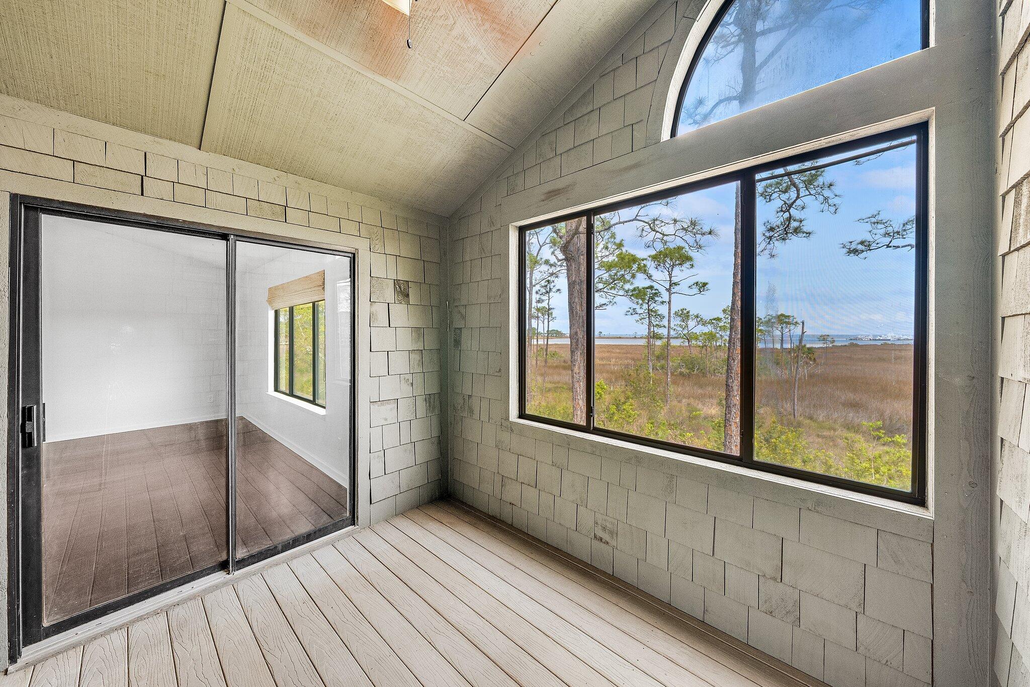 8983 Heron Walk Drive, Unit 8983 Miramar Beach, FL 32550 - Photo 28 of 57 a view of an entryway with wooden floor