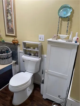 a spacious bathroom with a double vanity sink and a mirror