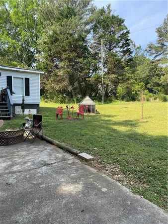 a childrens park with lots of trees