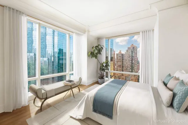 a kitchen with a sink and a stove top oven