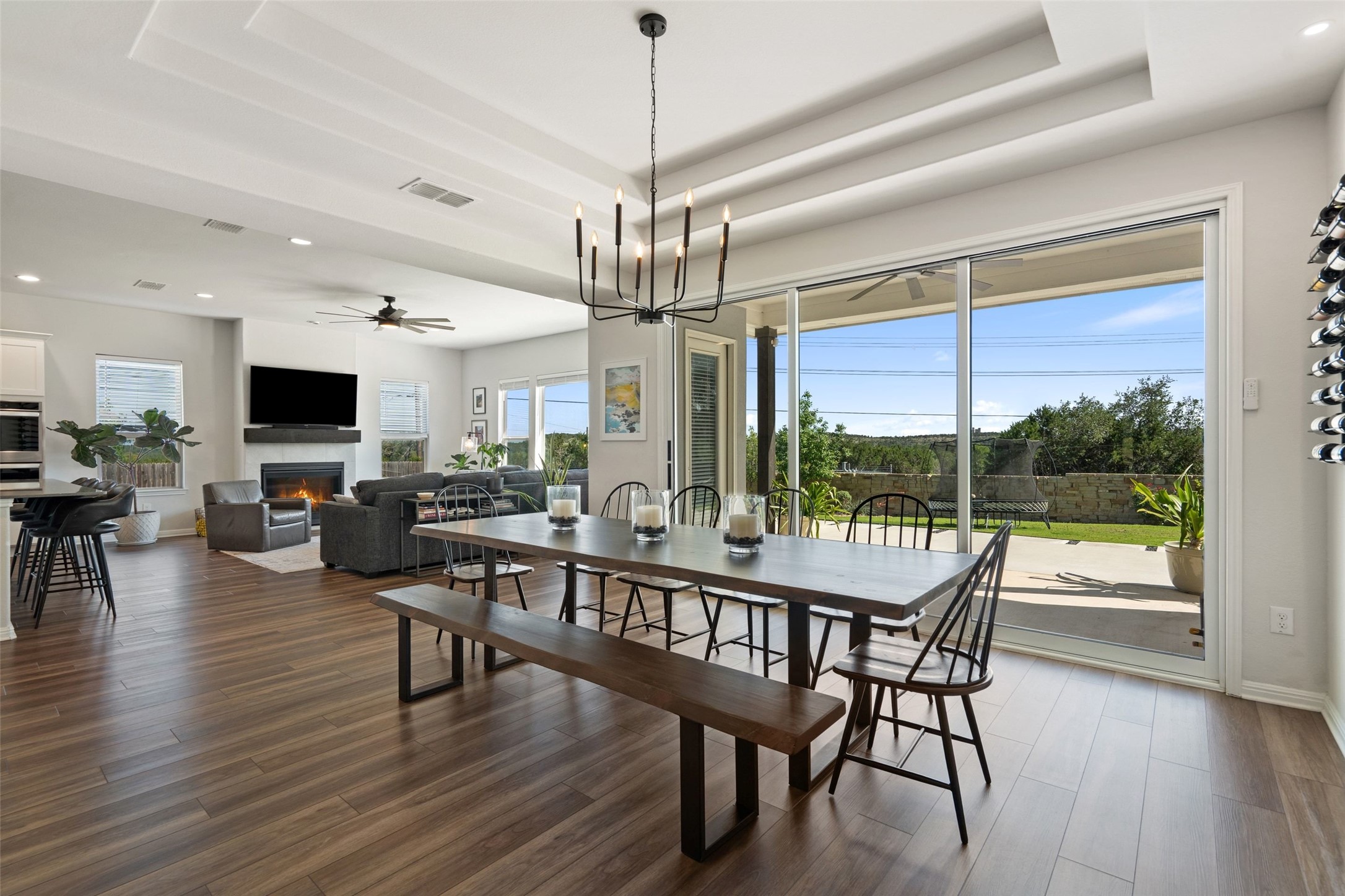 162 Lunar Loop Austin, TX 78737 - Photo 7 of 40 a view of a dining room with furniture window and wooden floor