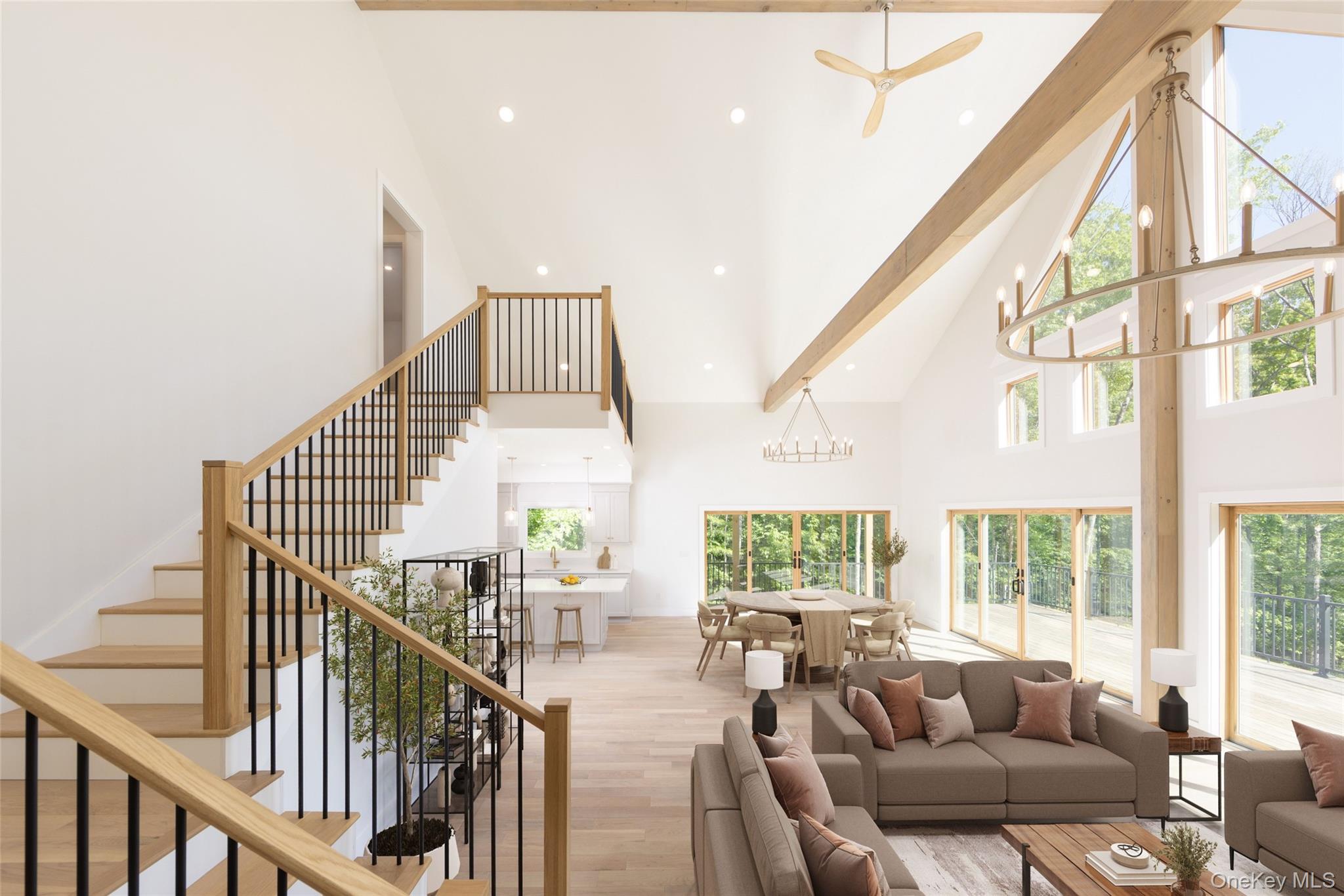 91 Lenni Lenape Road Narrowsburg, NY 12764 - Photo 2 of 25 Bright open-concept living space with a vaulted ceiling and exposed wood beamsImages have been virtually staged to illustrate the property's potential