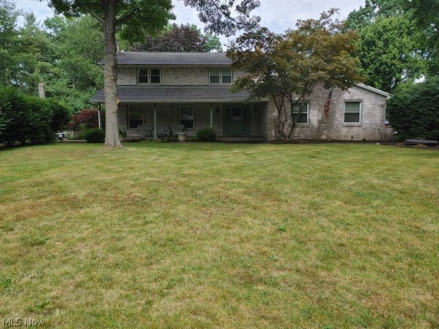 2211 Devonshire Road Northwest Canton, OH 44708 - Photo 1 of 36 View of front of property featuring a front lawn
