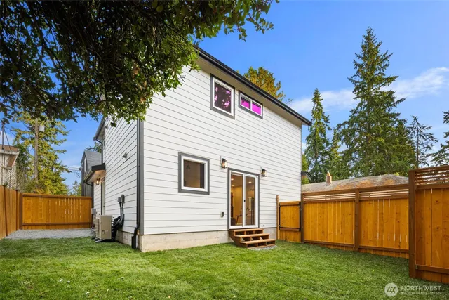 a view of backyard with a garden and plants