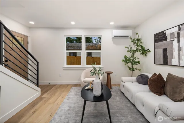a living room with furniture and window