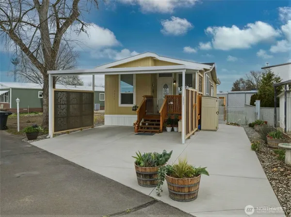 a front view of a house with patio