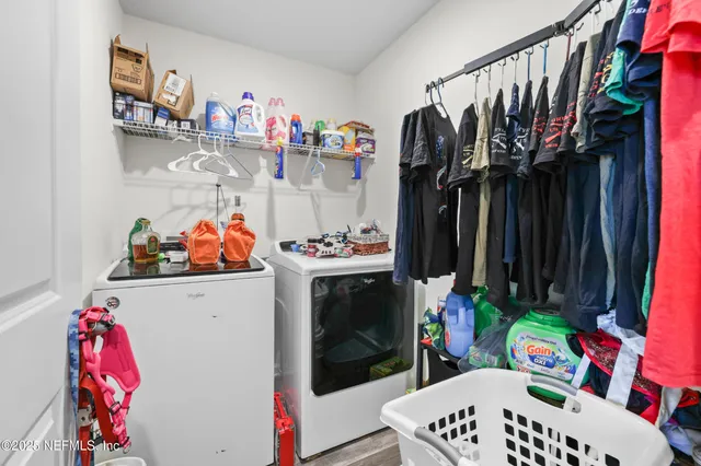 a bathroom with a sink and mirror with toilet
