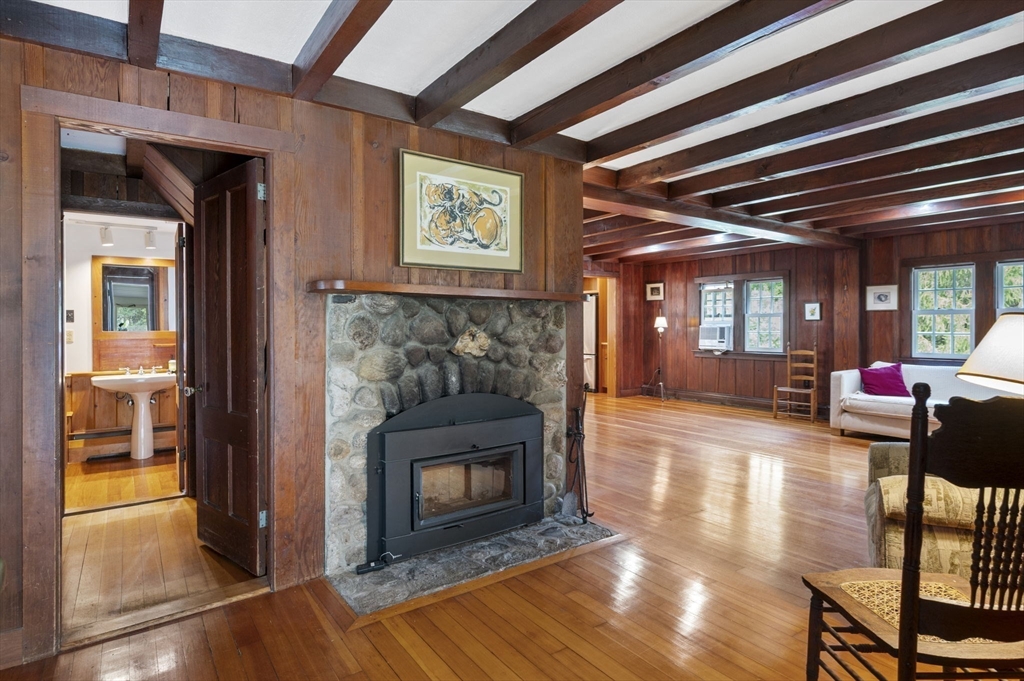 431 Moraine Street Marshfield, MA 02050 - Photo 12 of 38 a living room with furniture and a fireplace