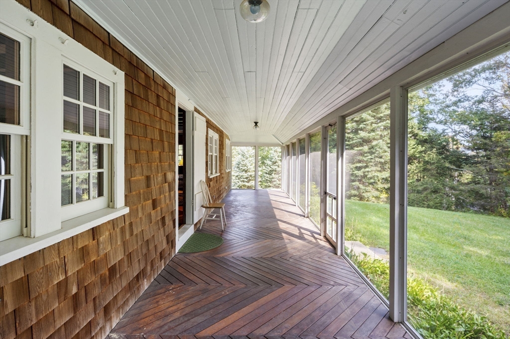 431 Moraine Street Marshfield, MA 02050 - Photo 13 of 38 a view of a porch with wooden floor and outdoor space