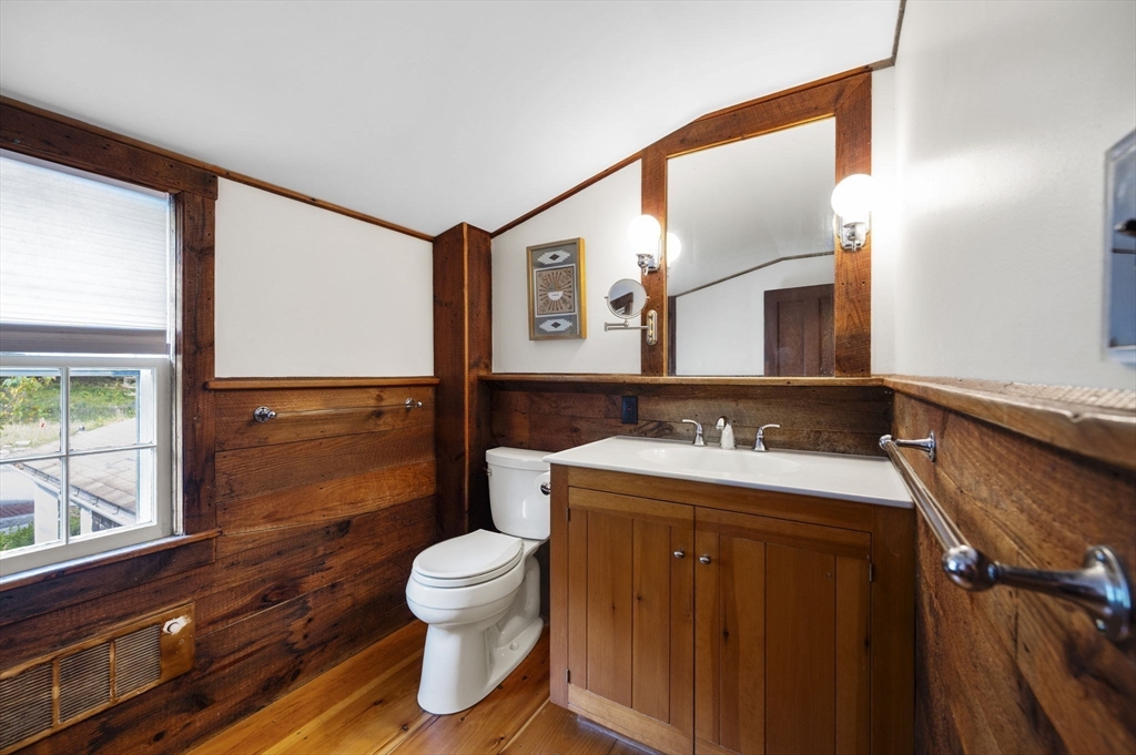 431 Moraine Street Marshfield, MA 02050 - Photo 18 of 38 a bathroom with a sink toilet and mirror