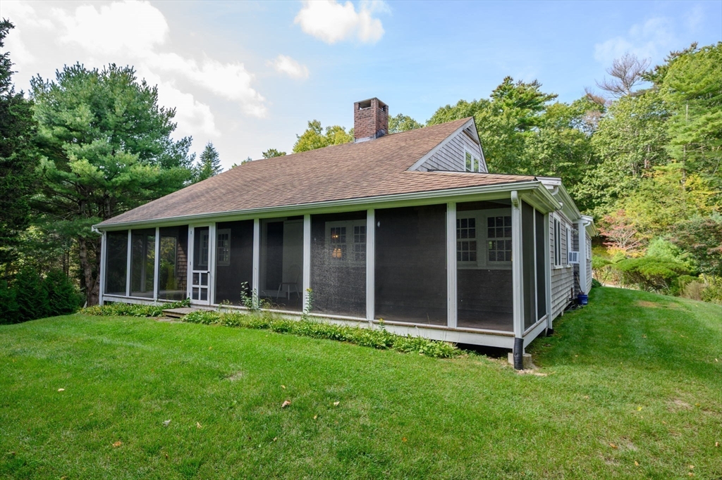 431 Moraine Street Marshfield, MA 02050 - Photo 25 of 38 a view of an house with backyard space and garden