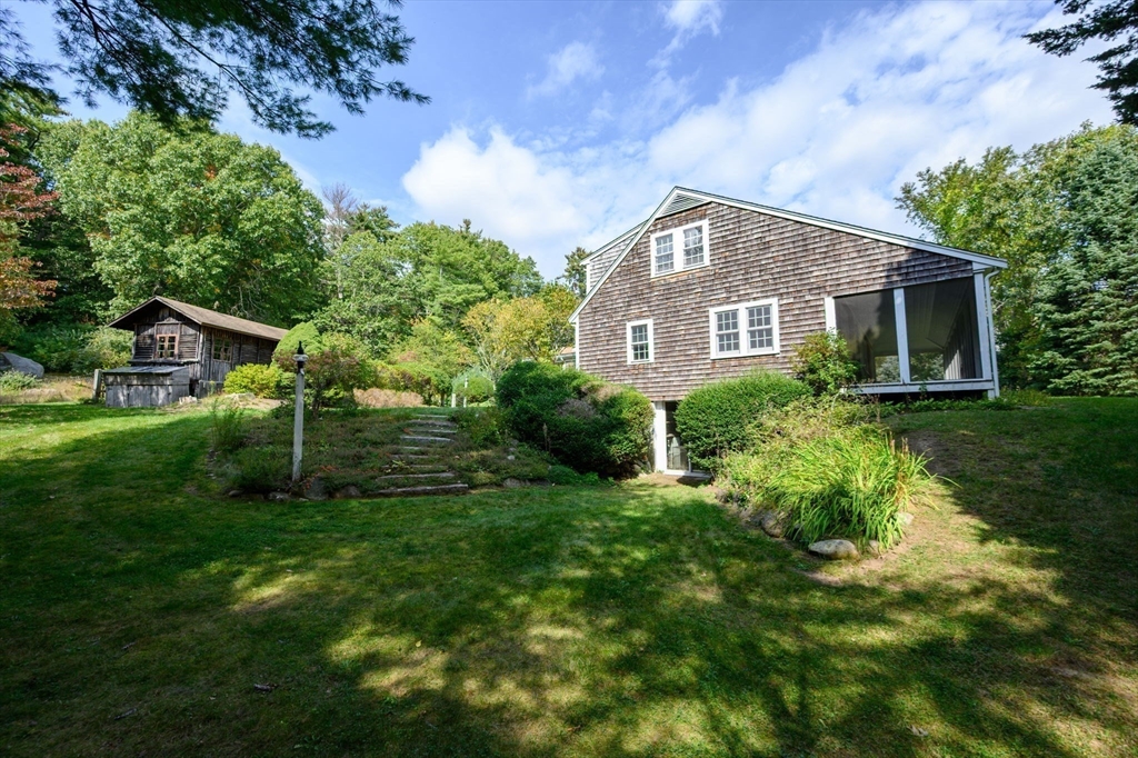 431 Moraine Street Marshfield, MA 02050 - Photo 26 of 38 a front view of a house with a yard