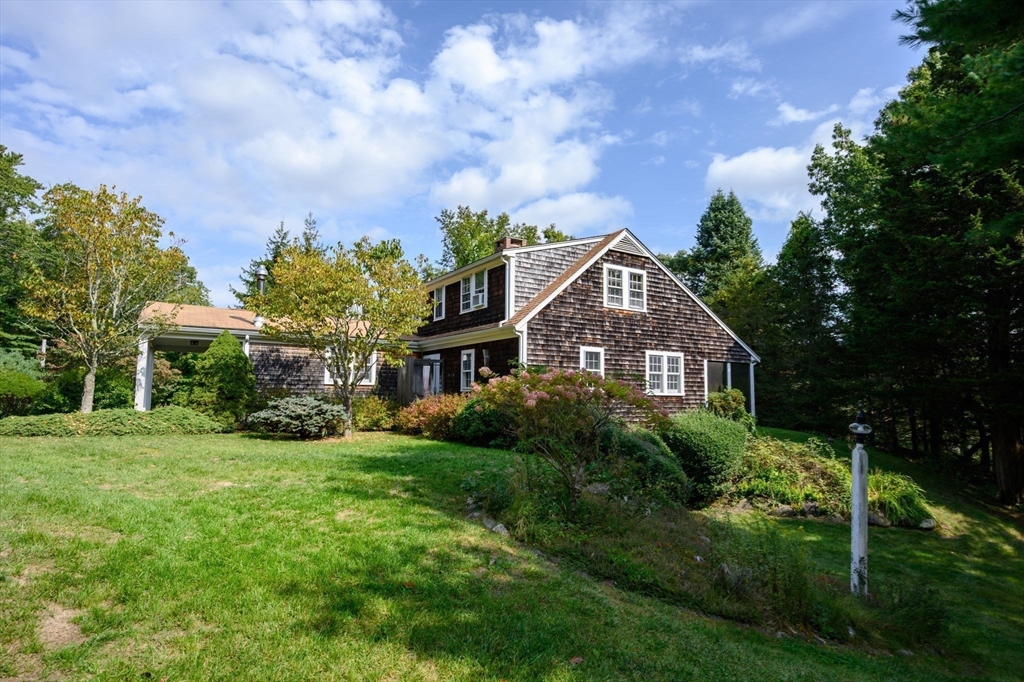 431 Moraine Street Marshfield, MA 02050 - Photo 30 of 38 a front view of a house with a yard