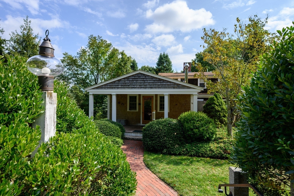 431 Moraine Street Marshfield, MA 02050 - Photo 3 of 38 a front view of a house with garden