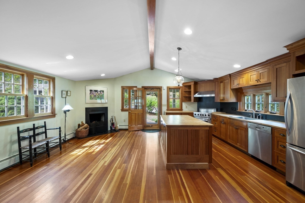 431 Moraine Street Marshfield, MA 02050 - Photo 7 of 38 a kitchen with stainless steel appliances granite countertop a stove and a wooden floors