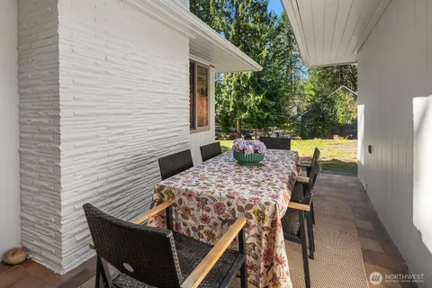 a view of a outdoor seating area with furniture