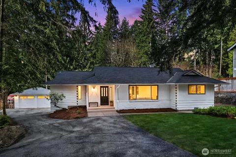 a front view of house with yard and seating area