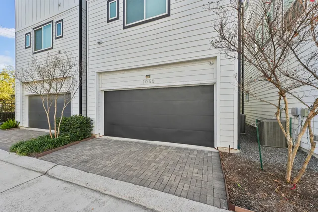 a view of a building with a yard