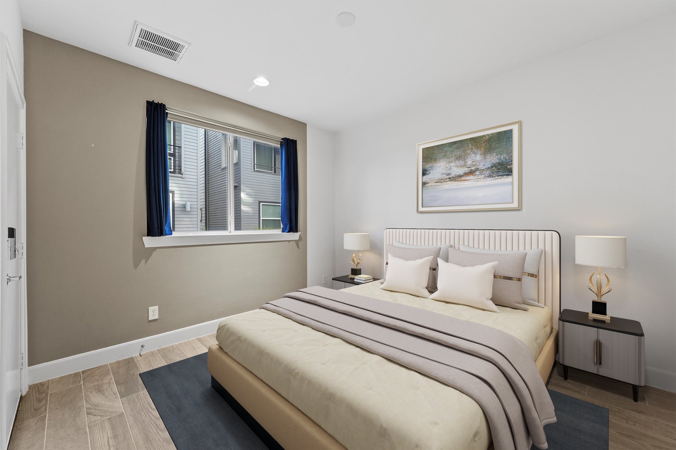 1050 Timbergrove Yards Lane Houston, TX 77008 - Photo 5 of 33 a bedroom with bed and wooden floor