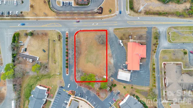 view of living room with furniture and flowers
