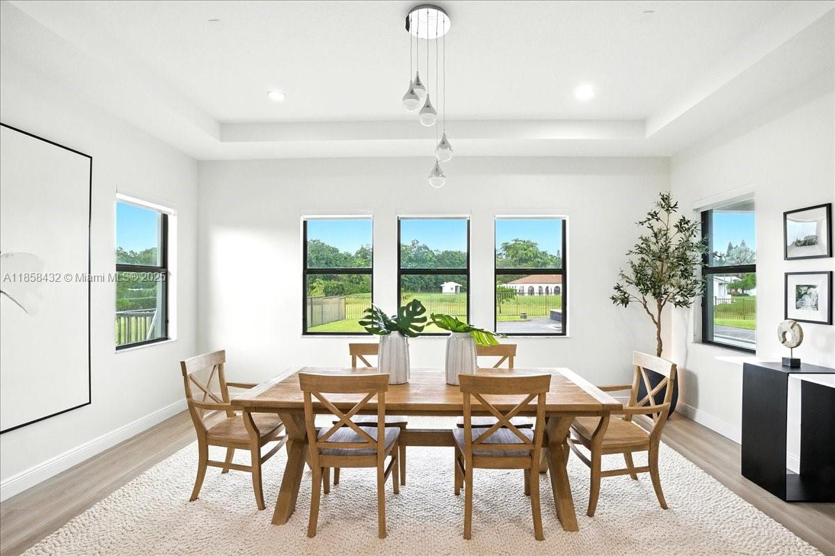 17819 Southwest 58th Street Southwest Ranches, FL 33331 - Photo 18 of 56 a view of a dining room with furniture window and outside view