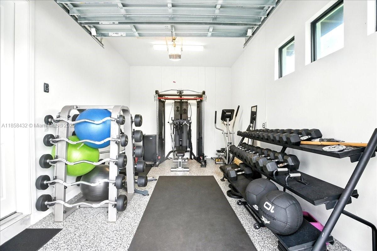 17819 Southwest 58th Street Southwest Ranches, FL 33331 - Photo 39 of 56 a view of a room with gym equipment