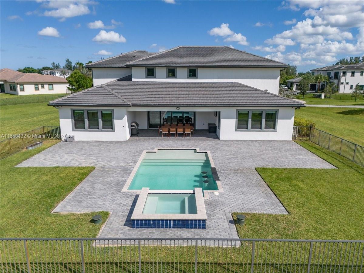 17819 Southwest 58th Street Southwest Ranches, FL 33331 - Photo 47 of 56 front view of a house with a yard