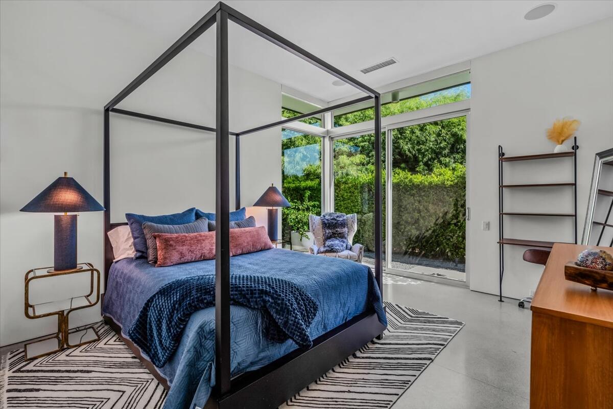 71466 San Gorgonio Road Rancho Mirage, CA 92270 - Photo 41 of 81 a bedroom with a large bed and a window