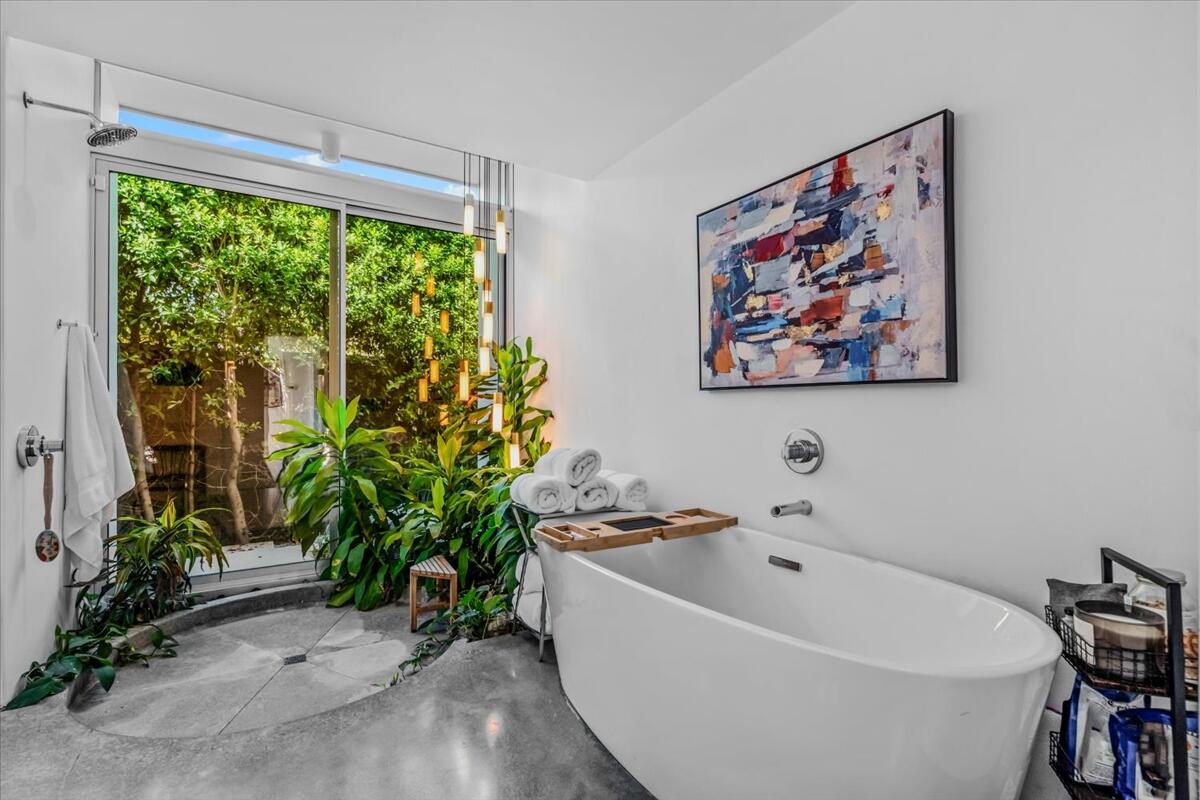 71466 San Gorgonio Road Rancho Mirage, CA 92270 - Photo 42 of 81 a white bath tub sitting in a bathroom next to a window