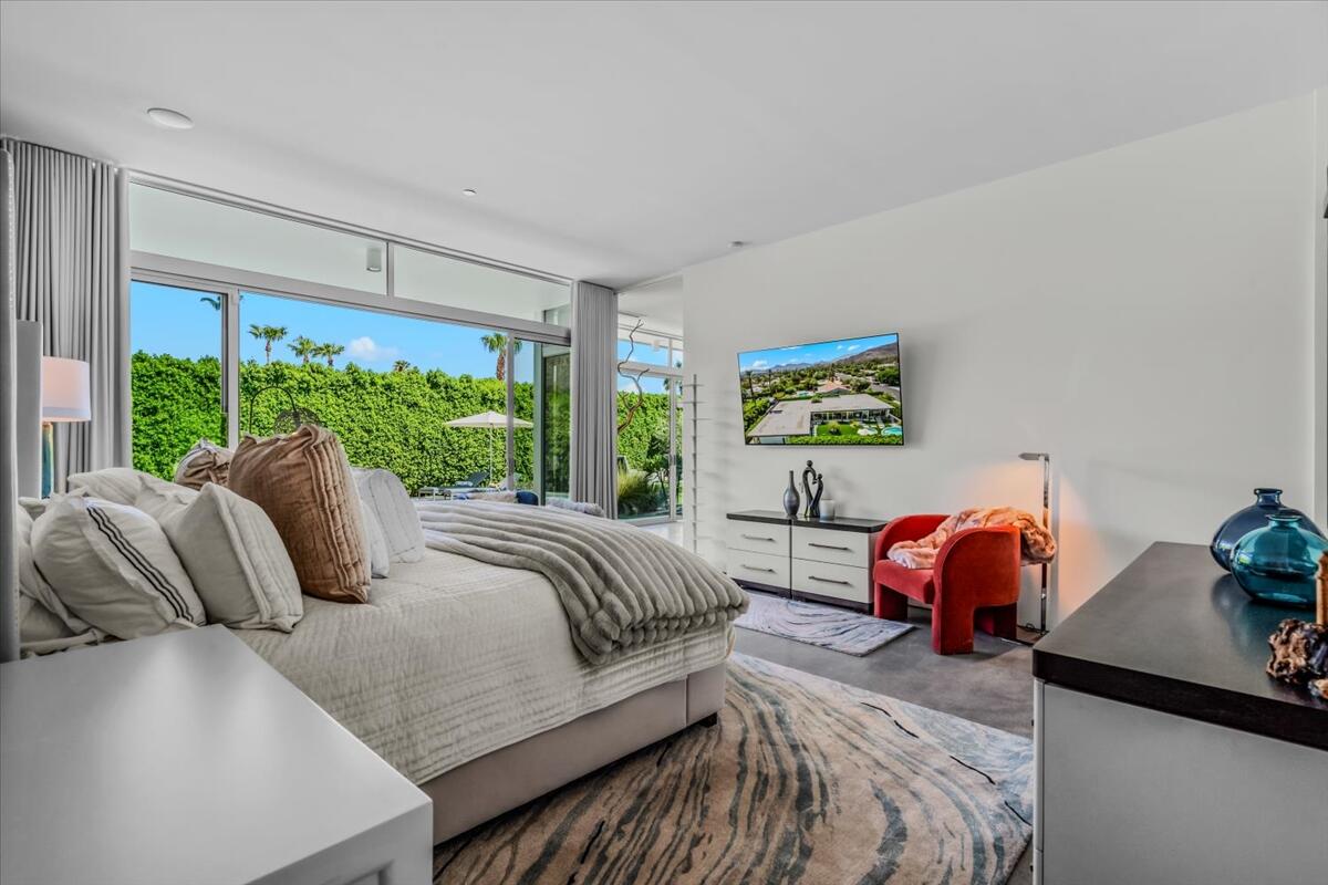 71466 San Gorgonio Road Rancho Mirage, CA 92270 - Photo 46 of 81 a bedroom with a bed and window