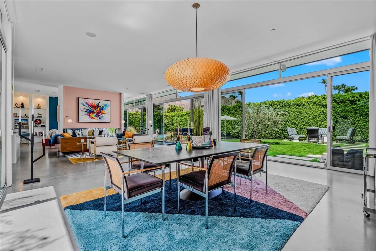 71466 San Gorgonio Road Rancho Mirage, CA 92270 - Photo 56 of 81 a view of a dining room with furniture wooden floor and chandelier