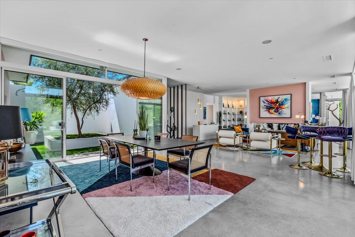 71466 San Gorgonio Road Rancho Mirage, CA 92270 - Photo 60 of 81 a living room with furniture a window and a table