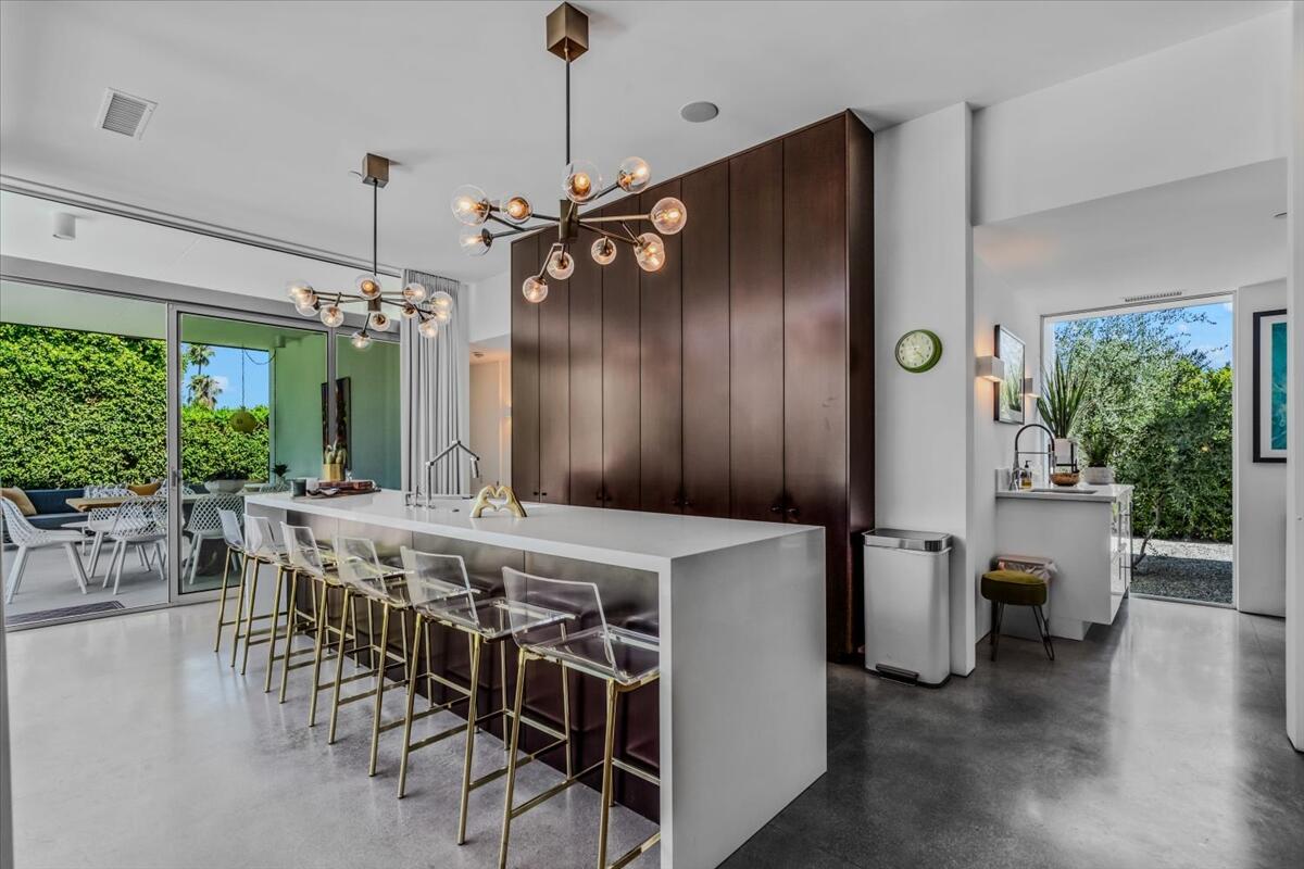 71466 San Gorgonio Road Rancho Mirage, CA 92270 - Photo 62 of 81 a view of a dining room with furniture window and wooden floor