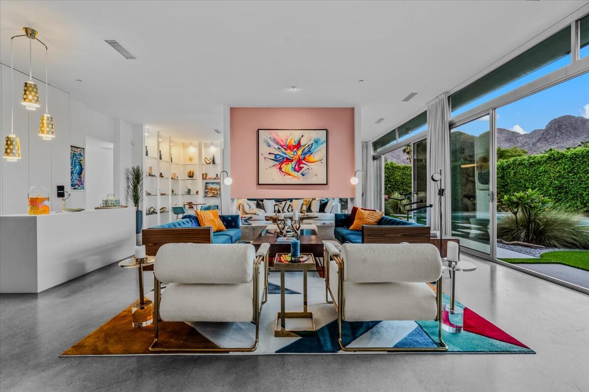 71466 San Gorgonio Road Rancho Mirage, CA 92270 - Photo 72 of 81 a living room with furniture and a large window