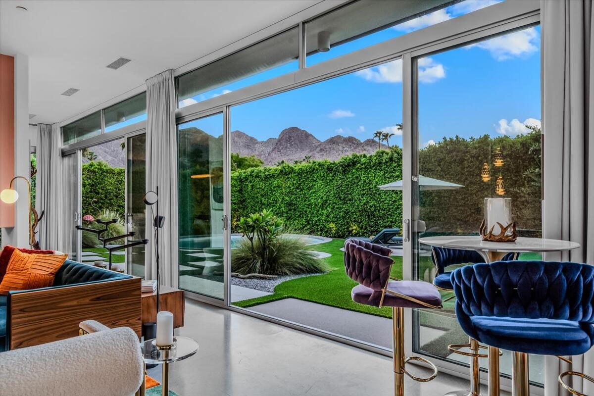 71466 San Gorgonio Road Rancho Mirage, CA 92270 - Photo 73 of 81 a balcony with furniture and a garden