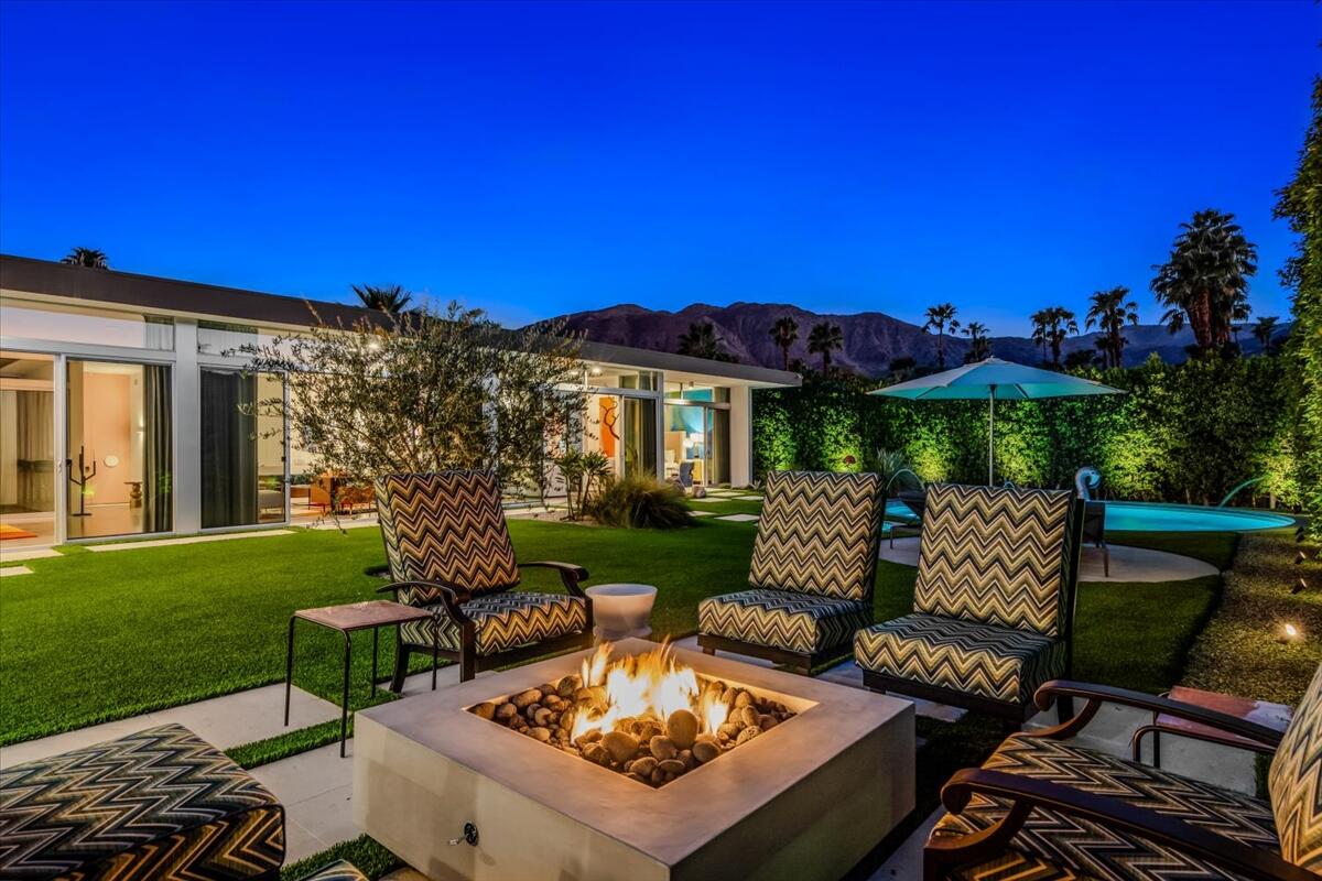 71466 San Gorgonio Road Rancho Mirage, CA 92270 - Photo 9 of 81 a view of a patio with couches table and chairs with garden view