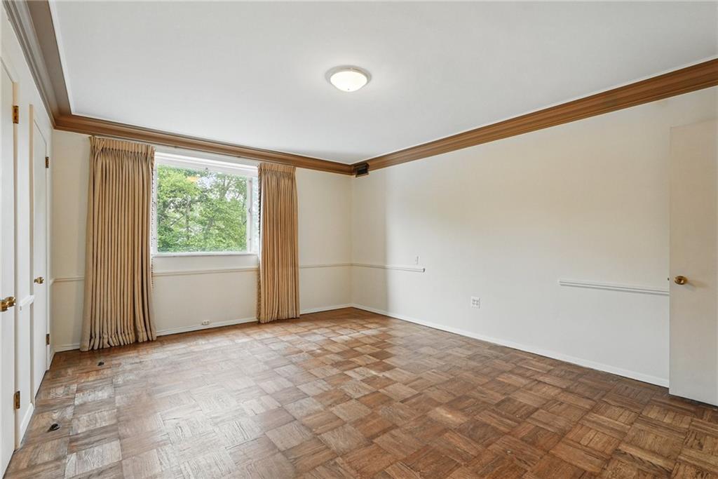 5048 Fifth Avenue, Unit 101 Pittsburgh, PA 15232 - Photo 20 of 24 a view of an empty room with a window