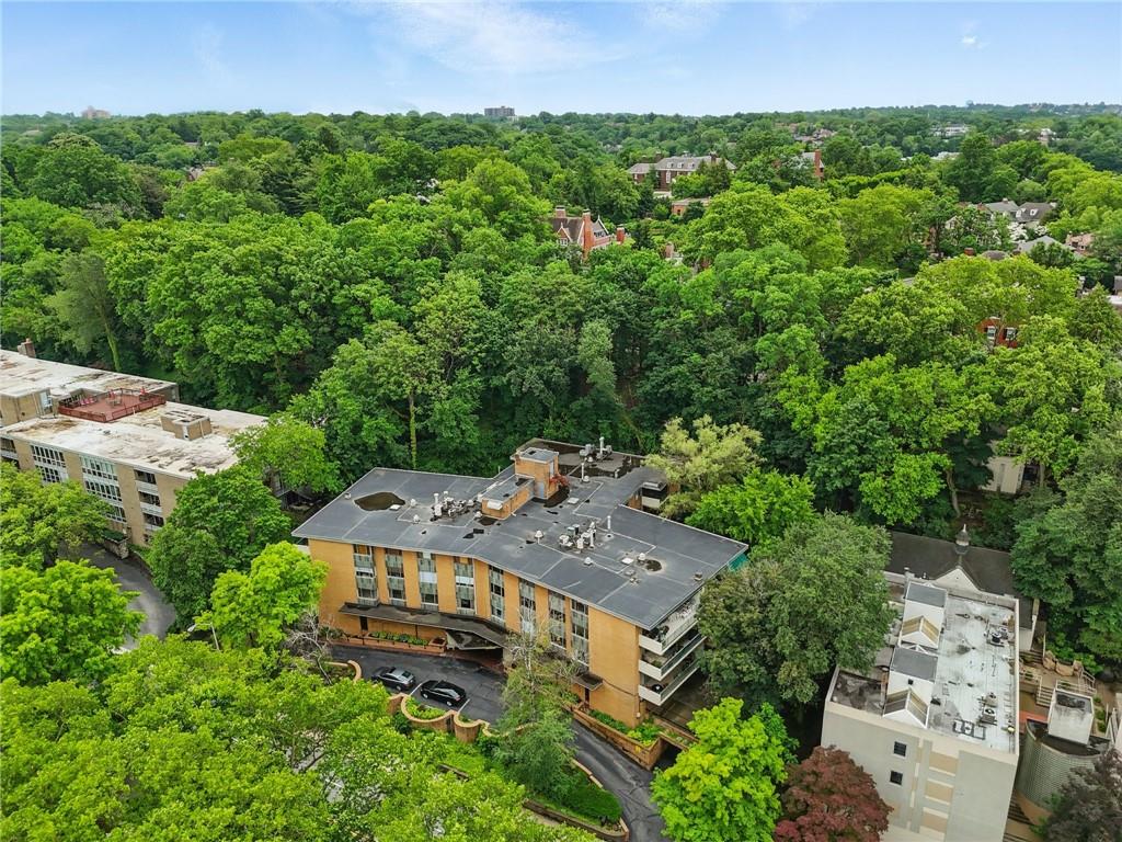 5048 Fifth Avenue, Unit 101 Pittsburgh, PA 15232 - Photo 24 of 24 an aerial view of a house with a yard and lake view